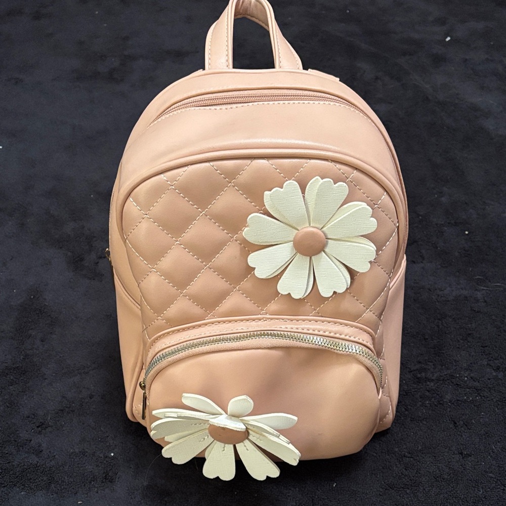 Chic Quilted Pink Backpack with Floral Accents